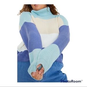 In the style CURVE BILLIE FAIERS NAVY MULTI STRIPE CROPPED KNITTED